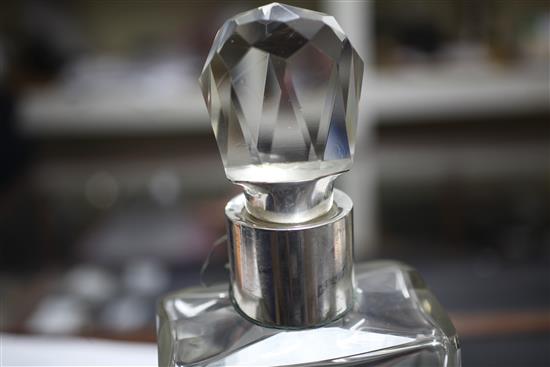 A George V silver mounted plain glass lockable decanter by Asprey & Co Ltd, 32.5cm.